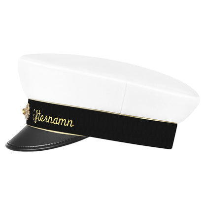 Studentmössa i svart med guldbroderi och kristallemblem, sedd från sidan för en klassisk och tidlös look.