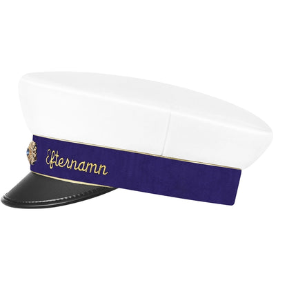 Studentmössa i lila med guldkant, visad från sidan för att framhäva detaljerna i designen och broderiet.